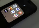 A close up of a cell phone on a table