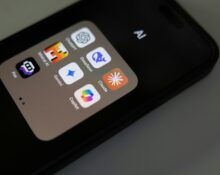 A close up of a cell phone on a table